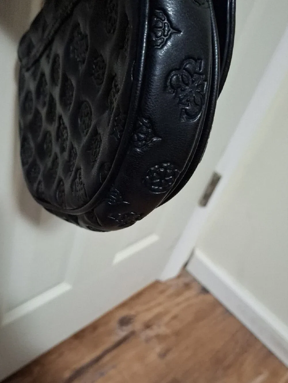 GUESS Black Embossed Leather Shoulder Bag with Gold Chain and Charm Accent